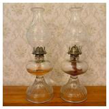A Pair of Clear Glass Oil Lamps with Home Sweet Ho