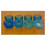 A Set of Eight Moon and Star Pattern Blue Pressed