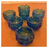 A Set of Six Teal Blue Moon and Star Pattern Press