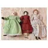 A Trio of Glazed Porcelain Head Dolls in Period St