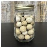 A Collection of Antique Hand-Rolled Clay Marbles i