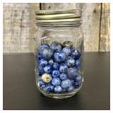 A Collection of Sodalite and Jasper Stone Marbles
