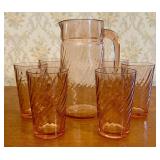 A Seven Piece French Pink Glass Beverage Set in Sw
