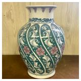 A famille rose spiral-paneled baluster vase, 20th