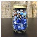A Collection of Assorted Vintage Glass Marbles in
