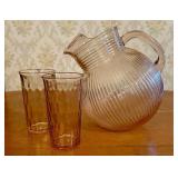A Pink Depression Glass Ball Pitcher and Two Coord