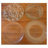 A Collection of Four Pressed Glass Serving Platter