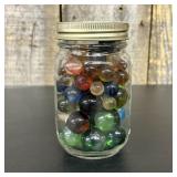 A Collection of Assorted Vintage Glass Marbles in