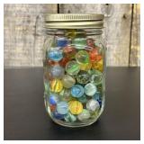 An Assortment of Vintage and Modern Glass Marbles