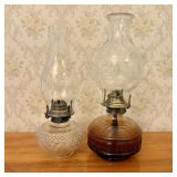 Two Glass Oil Lamps Including One Amber Pressed Gl