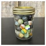 A Collection of Assorted Vintage Glass Marbles in