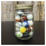 A Collection of Vintage Machine-Made Glass Marbles