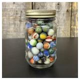 A Collection of Vintage Machine Made Glass Marbles