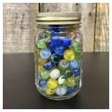 An Assortment of Vintage and Modern Glass Marbles