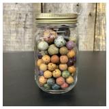 A Collection of Antique Glazed and Painted Clay Ma
