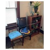 Chairs, Artificial Plants and Book Shelf