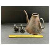 Oil can and wooden figures