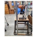 Cut off saw with rolling table