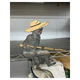 Metal fisherman