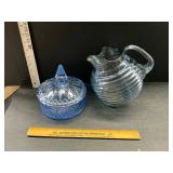 Blue glass pitcher and candy dish