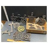 Cast iron trivet lot