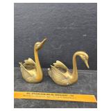 Brass swans