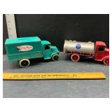 Die cast bank both have coins in them