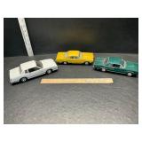 3 die cast cars