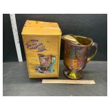 Carnival glass pitcher