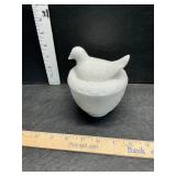 Milk glass pigeon on nest