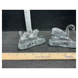 Solid glass swans