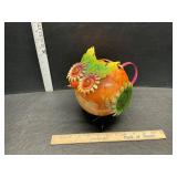 Metal bird pitcher