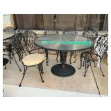 Iron table with 6 chairs with cushions
