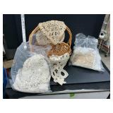 Basket with vintage table cloths and Dollieï¿½s