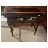 Antique table with contents