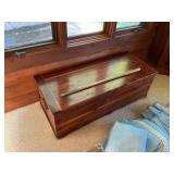 Large cedar trunk with contents