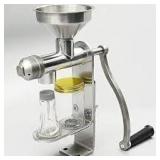 Oil press for extracting oil from seeds