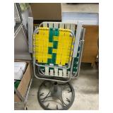 Lawn chairs and umbrella stand