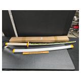 2 Anime swords one used one new in box