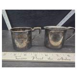 Water cups one is sterling silver Water cups one is sterling silver