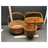 3 Longaberger baskets 1 with crisco on handle 3 Longaberger baskets 1 with crisco on handle