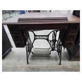 Singer treadle machine and contents Singer treadle machine and contents