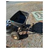 Pull behind spreader