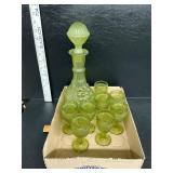 Vintage green glass bottle and glasses