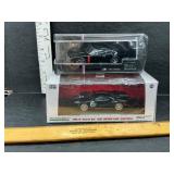 2 die cast cars