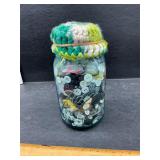 Blue jar with buttons