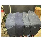 4 pair of Carhartt work pants