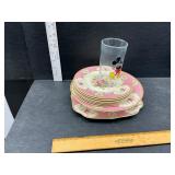 Vintage dishes and a glass