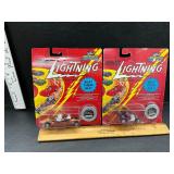 2 Johnny Lightning cars