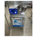 Snow cone machine